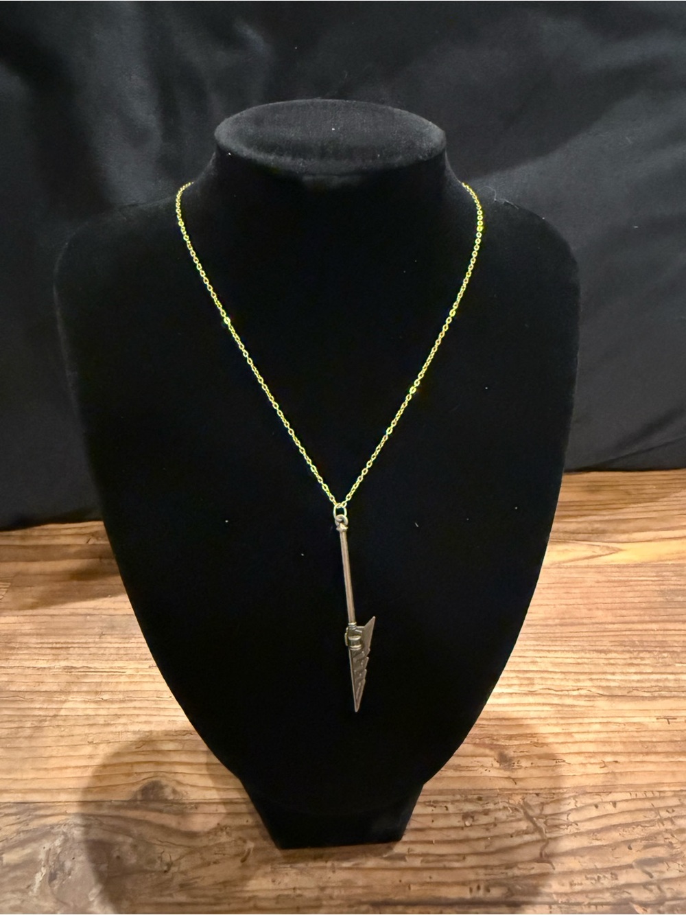 Gold sword necklace